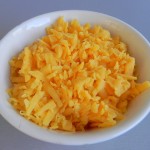 Queso cheddar rallado